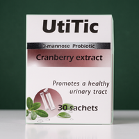 UtiTic Cranberry Urinary Support on green studio background