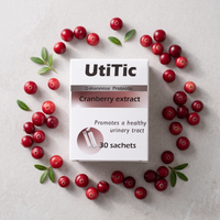 UtiTic Cranberry D-Mannose Sachets box surrounded by fresh cranberries